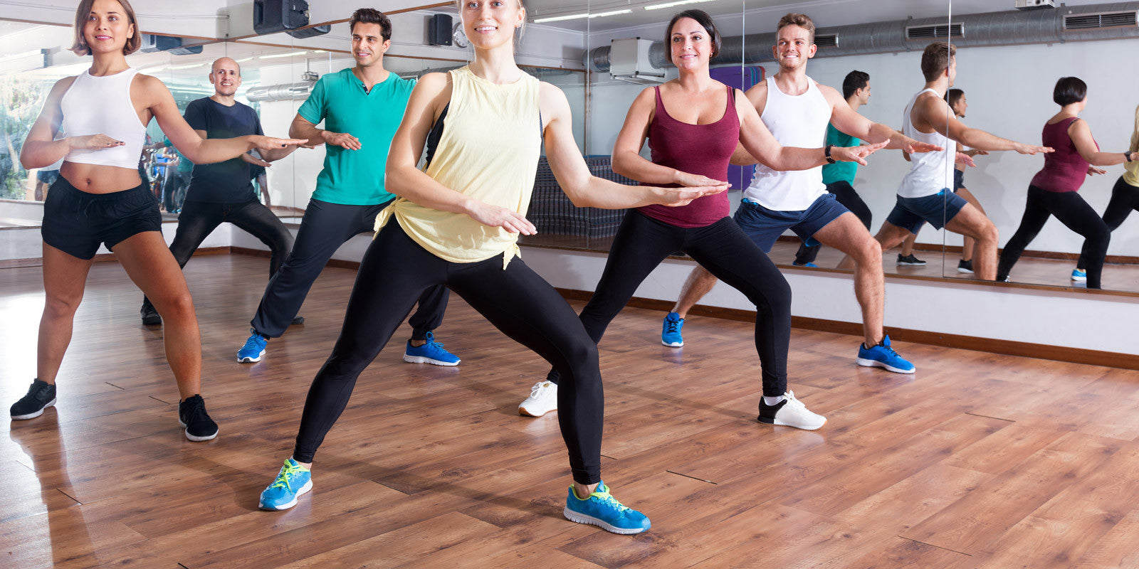 Zumba aerobic dance class on a wooden flooring…